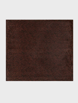 Soft and cozy Laurel Canyon blanket showcasing a charming Ryuu flower design, ideal for adding warmth to your space.