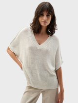 Soft, lightweight knit v-neck sweater designed as a tunic for women.