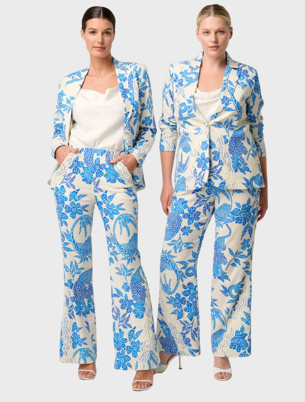 Two women in blue and white floral print pantsuits, showcasing a stylish Leandro Contrast Lace Linen Viscose Stretch Blazer.