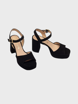 Elegant black suede platform sandals with a gold buckle, showcasing a wide heel and crafted in Kid Suede-Cranberry leather.