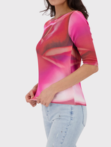 Pink Leglet T-shirt with an all-over floral print, perfect for spring and casual wear, offering comfort and style.