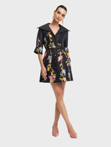 Ebony mini dress adorned with a lemon vine print, showcasing a chic sleeve design for a fashionable appearance.