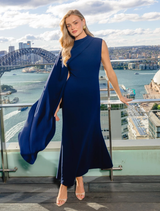 Elegant deep navy asymmetric cape dress by Leonara, showcasing a unique design perfect for special events.