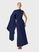 Deep navy Leonara asymmetric cape dress, featuring a flowing silhouette and elegant design for formal occasions.