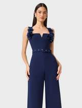 Deep navy sleeveless jumpsuit by Leonara, featuring a fitted bodice and wide-leg pants for a stylish look.