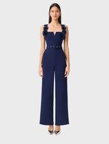 Deep navy sleeveless jumpsuit by Leonara, featuring a fitted bodice and wide-leg pants for a stylish look.