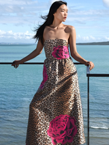 Luxurious leopard floral dress with pleated bodice, boned sides, removable straps, and convenient side pockets for style.