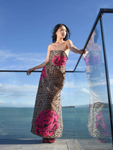 Chic leopard floral dress with pleated design, boned sides, removable straps, and side pockets for a modern, elegant look.