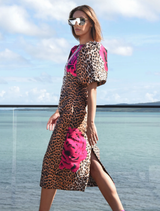 Elegant leopard floral dress featuring structured sleeves, fitted silhouette, and a back hem split for comfort.