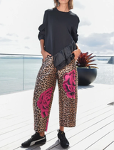 Modern barrel-leg trousers in leopard floral print, made from textured jacquard with an elasticated back for ease of wear.