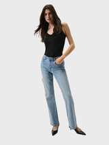 Classic light blue bootcut jeans made from stretch denim, offering comfort and a flattering silhouette.