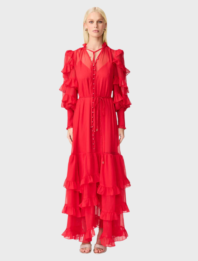 A long red dress featuring ruffled sleeves, elegantly flowing and vibrant in color.