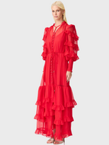  A long red dress adorned with ruffled sleeves, combining elegance and a striking color for a stunning look.
