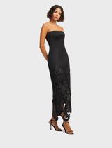 An elegant ebony maxi dress with a fitted appliqué bustier, designed for a sophisticated and chic look.