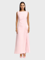 A flowing maxi dress in a soft fairy floss pink, featuring a flattering silhouette and delicate fabric.
