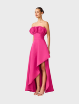 Elegant pink orchid gown featuring a strapless design and asymmetric structure, perfect for formal occasions.