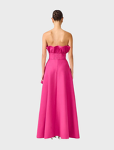 Strapless asymmetric gown in pink orchid, designed with structured elements for a sophisticated and stylish look.