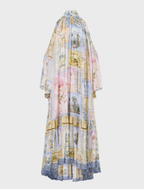 Stylish cold shoulder long dress with a floral botanical design, suitable for outdoor events and special occasions.