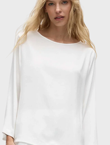 Stylish ivory LS Slice Neck Plaza Top with a contemporary slice neck design, suitable for various occasions.