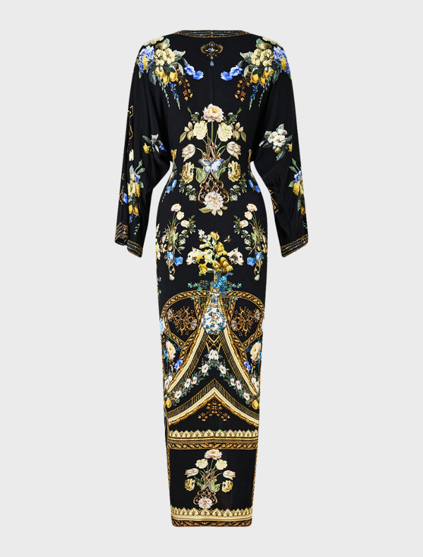 Long split front twist dress in Ottoman style, featuring elegant draping and a sophisticated silhouette.