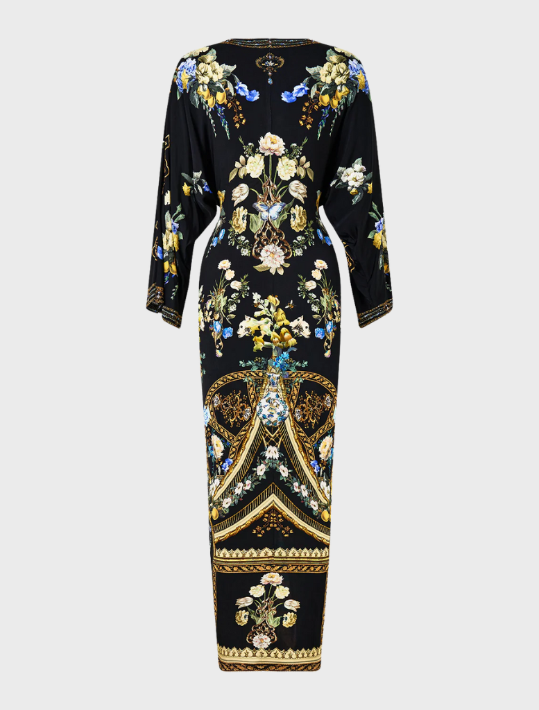 Long split front twist dress in Ottoman style, featuring elegant draping and a sophisticated silhouette.