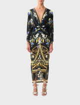 Ottoman elegance in a long dress with a split front and twist detail, perfect for formal occasions and stylish events.