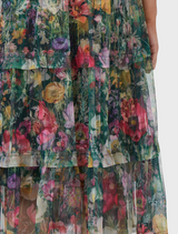 A floral dress named "Looking Glass Tulle Dress - Ivy Multi," crafted from a bright and colorful floral print fabric.