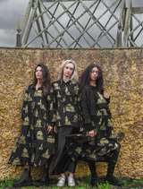 Black and gold Loom With A View dress, designed with elegance and flair, perfect for upscale events and celebrations.