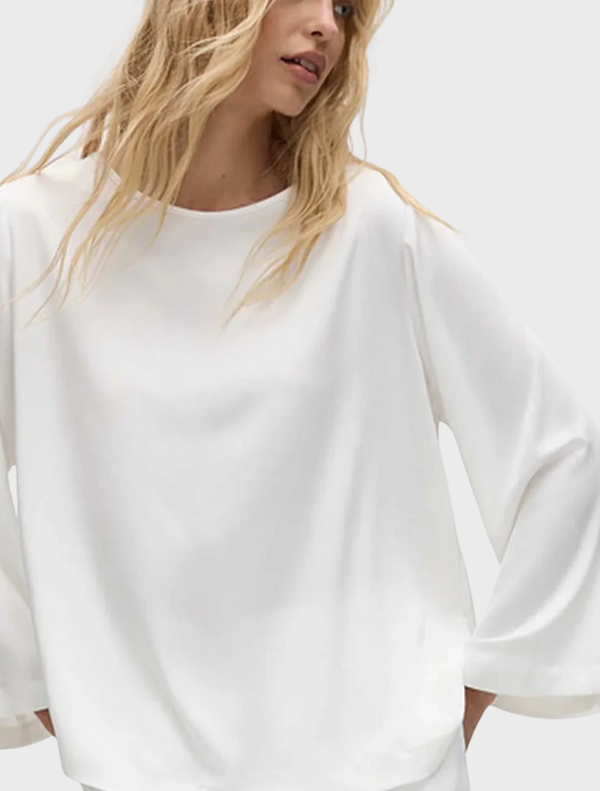 Ivory LS Slice Neck Plaza Top featuring a stylish slice neckline and a relaxed fit, perfect for casual wear.
