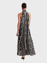 Stylish black Luana dress designed with a tailored fit and a soft, flowing skirt, ideal for special events.