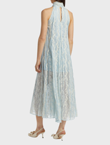 Aqua Luana Dress displayed on a mannequin, featuring a flowing design and elegant silhouette.