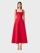 Red Lucetta square neck fit and flare midi dress displayed on a mannequin, showcasing its elegant silhouette and design.