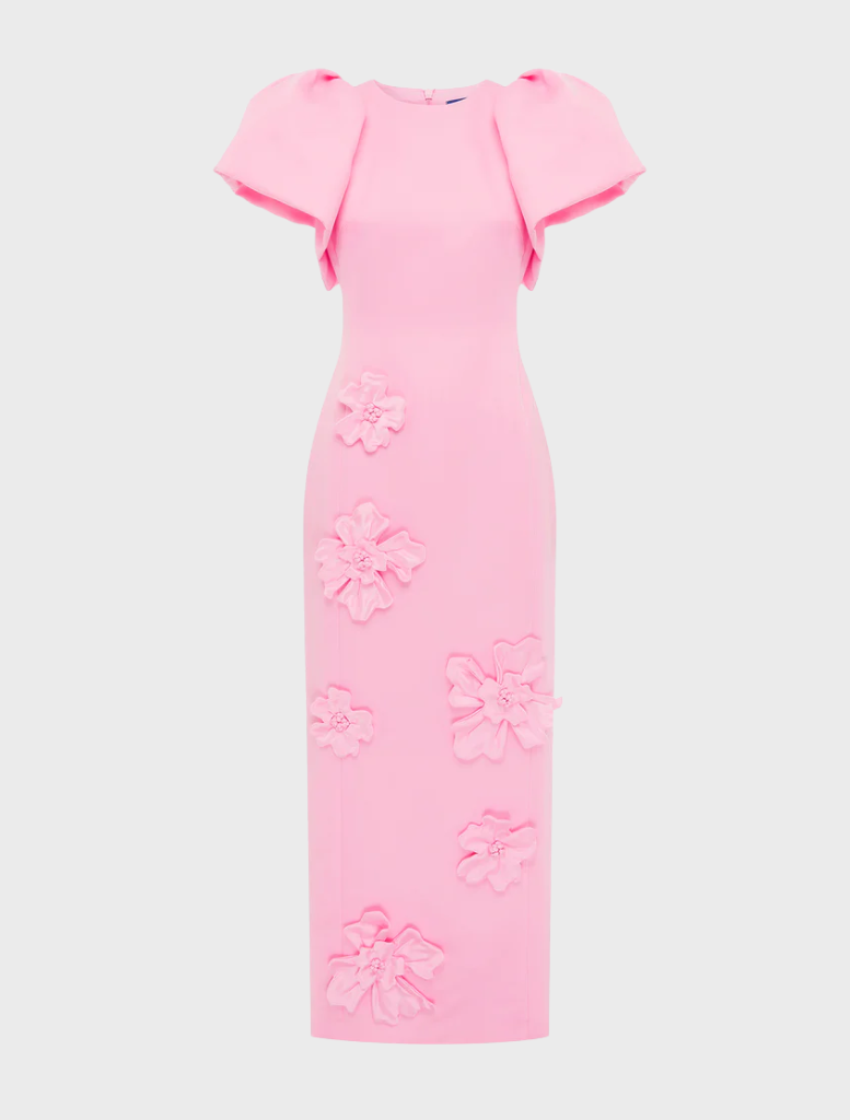 A pink dress showcasing a beautiful floral pattern, combining elegance with a touch of nature-inspired design.