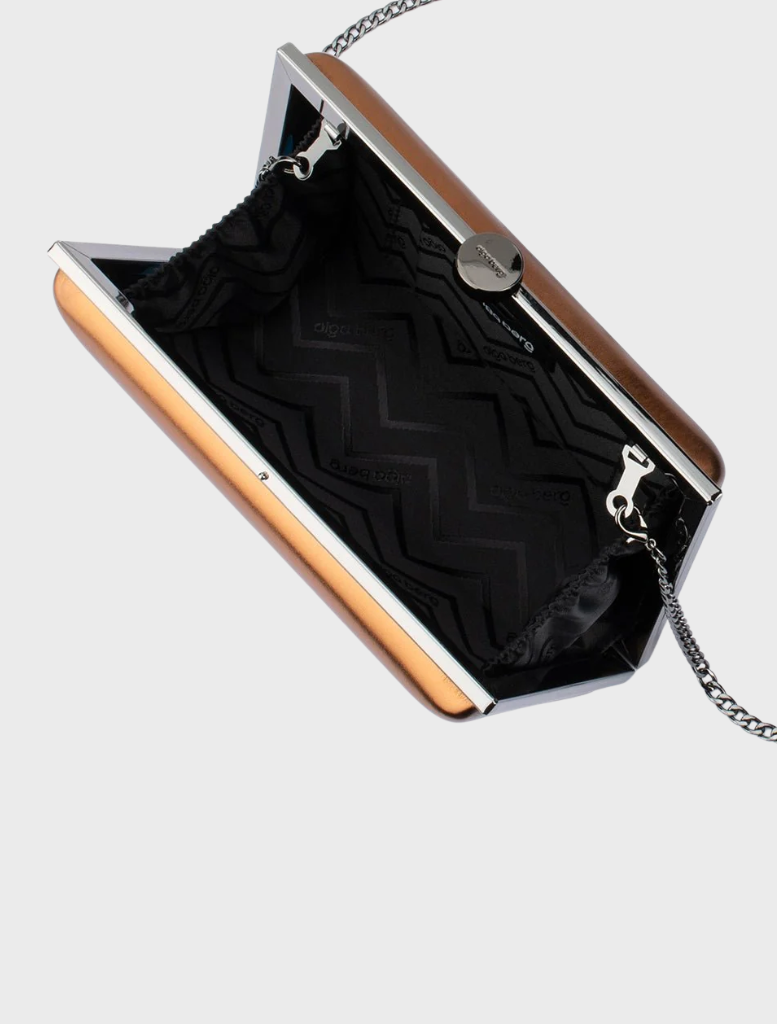 Bronze clutch bag in shiny metal, exhibiting a sleek design with a polished, reflective finish.
