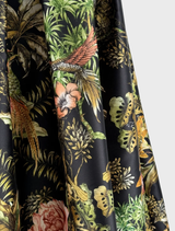 Wide black midi skirt with a high waist, crafted from printed mikado fabric, includes an invisible zip and pockets.
