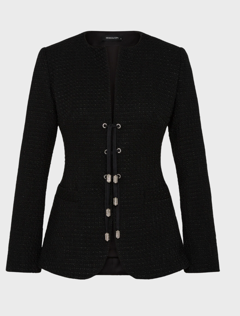 A black suit and shorts, presenting a chic and contemporary fashion statement.