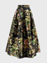 Black high-waisted midi skirt made of printed mikado fabric, featuring an invisible zip closure and pockets.