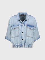 Light denim lyocell jacket featuring a shirt collar, ¾ sleeves, and elegant patch pockets for versatile styling.