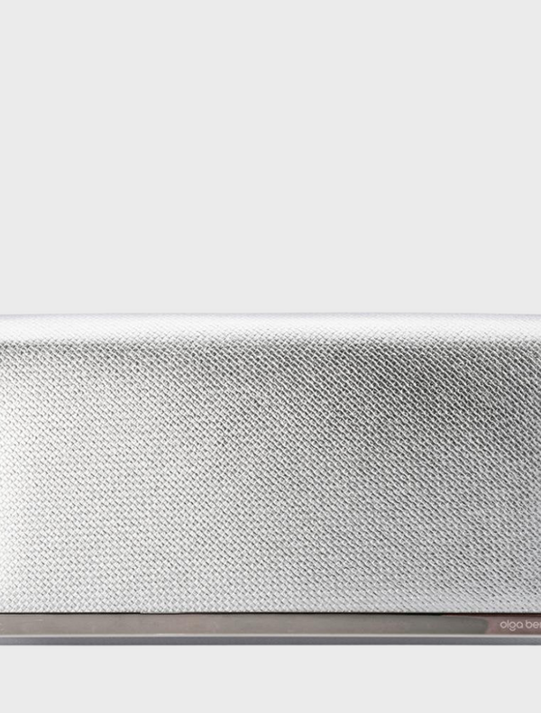 Silver wallet with a metal clasp, featuring a foldover design and embossed texture labeled Maddie Metallic Embossed.