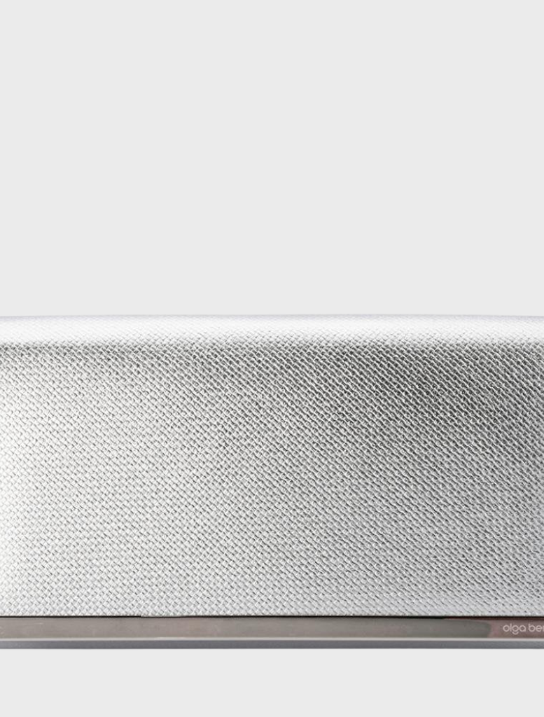 Silver wallet with a metal clasp, featuring a foldover design and embossed texture labeled Maddie Metallic Embossed.