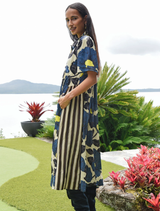 Romantic lime and blue floral dress featuring satin material, button closure, gathered waist, and contrasting side panels.