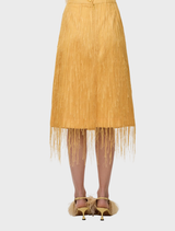 Elegant Harvest Gold midi skirt with fringe accents, designed to enhance occasion wear, can be paired with the matching top.