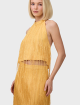 Statement fringe halter top in Harvest Gold, designed to add movement and style for glamorous occasions and evening outings.