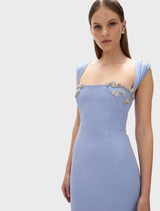  Stunning blue Malia gown with a flattering fit and soft draping, designed for sophisticated formal wear.