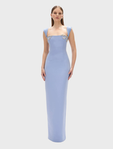 Elegant blue Malia gown featuring a flowing silhouette and delicate fabric, perfect for formal occasions.