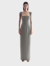 Elegant Malia gown in smoke color, featuring a flowing silhouette and delicate fabric for a sophisticated look.