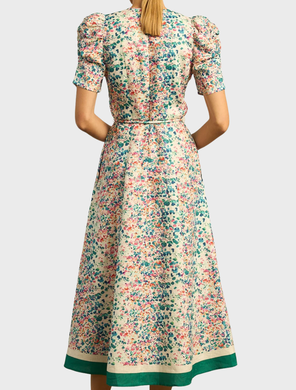 The Glimmer Dress showcases a marble design, combining elegance with a graceful fit for formal occasions.