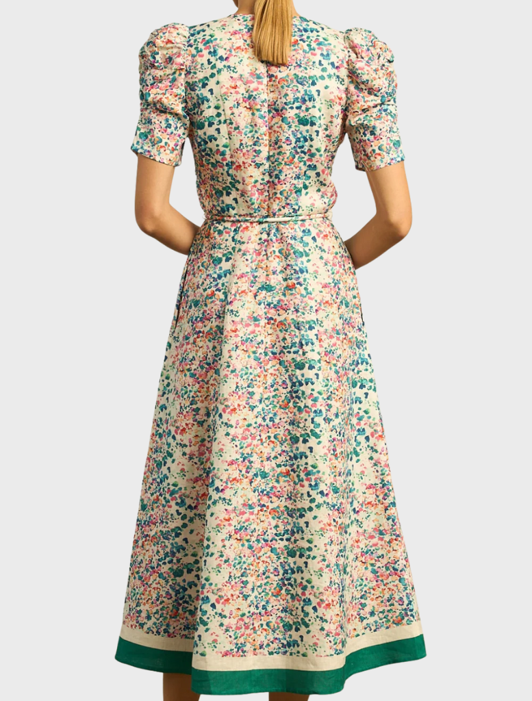 The Glimmer Dress showcases a marble design, combining elegance with a graceful fit for formal occasions.