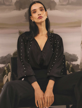 Black cupro stretch shirt by Marcela Pearl, featuring elegant embellishments for a stylish look.
