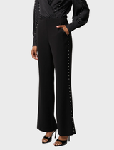 Marcela Pearl's black embellished pants made from viscose stretch fabric, perfect for a fashionable outfit.